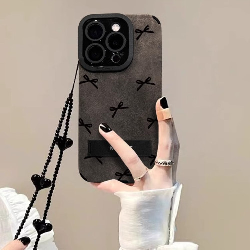 蝴蝶結支架手鏈適用蘋果15手機殼14pro奢華高級13矽膠防摔X翻毛皮