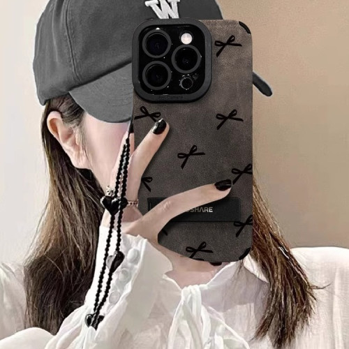 蝴蝶結支架手鏈適用蘋果15手機殼14pro奢華高級13矽膠防摔X翻毛皮