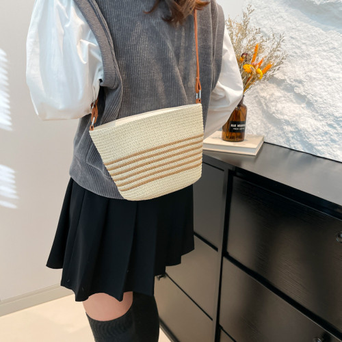 春季草編條紋潮流2025新款海邊大容量洋氣沙灘度假水桶斜背編織包