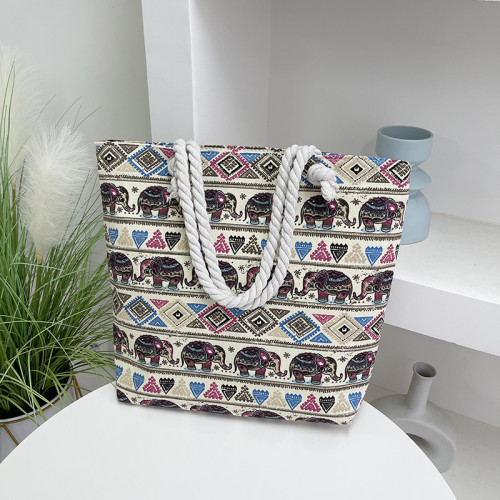 帆布包大容量女單肩包2024新款時尚印花出行托特包民族風印花