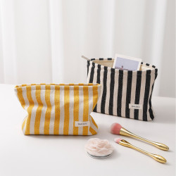 新款文藝簡約條紋帆布化妝包可攜式女生手拿包化妝品拉鍊收納包