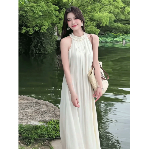 法式設計感無袖掛脖吊帶連衣裙女2025夏季新款寬松顯瘦度假風長裙