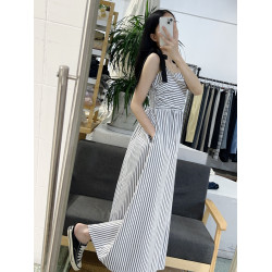 吊帶連衣裙女2024夏季新款減齡小衆設計感收腰顯瘦中長款背帶裙子
