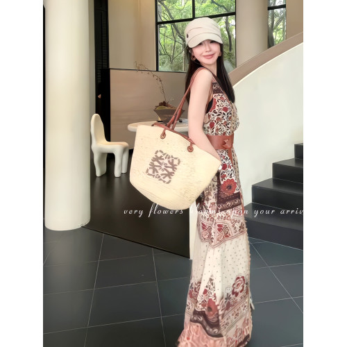 法式度假風印花無袖連衣裙女2025夏季設計感小衆百搭寬松顯瘦長裙