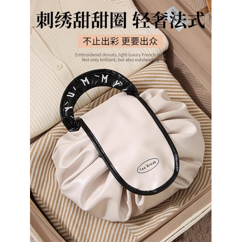 懶人化妝包女ins可攜式大容量化妝品收納包旅行防水袋抽繩洗漱包