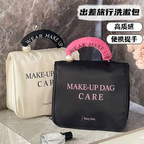 化妝包女2025新款高級手提可攜式大容量出差旅行隨身洗漱包高級感