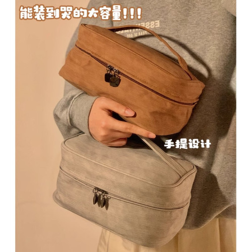 化妝包可攜式女2024新款高級分區大容量化妝品收納包出差旅行洗漱包