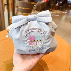 日系2025新款雙子星可愛少女心蝴蝶結印花收納包貝殼化妝包