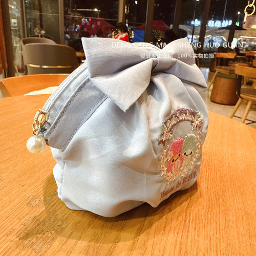 日系2025新款雙子星可愛少女心蝴蝶結印花收納包貝殼化妝包