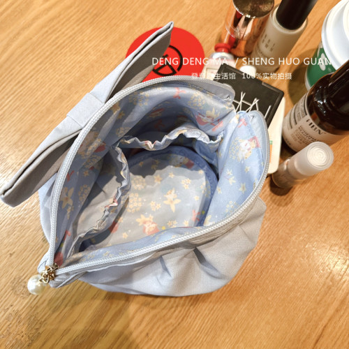 日系2025新款雙子星可愛少女心蝴蝶結印花收納包貝殼化妝包