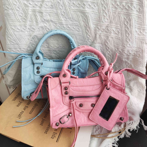 包包復古鉚釘機車包皮包手拎包高級感辣妹女小衆斜後背包軟皮女包