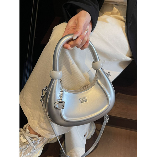 高級質感小衆包包女士2025新款女包超火百搭手提月牙包斜後背包