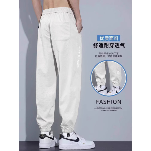 啄木鳥冰絲休閒褲男夏季薄款2025新款速乾寬松束腳運動工裝褲子K