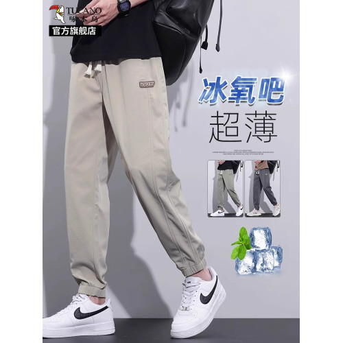啄木鳥冰絲薄款休閒褲子男2025夏季新款彈力寬松速乾束腳運動褲K