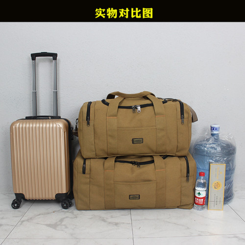 加密帆布簡約大容量長途手提行李衣服袋男單肩復古耐磨打工旅行包