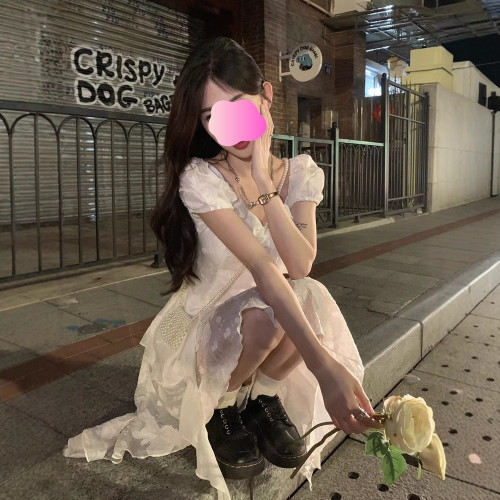 法式氣質初戀白色連衣裙女夏季新款收腰顯瘦純欲荷葉邊不規則裙子
