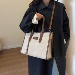 上班通勤包2025女大容量手提女包包新款感帆布撞色百搭斜背托特包
