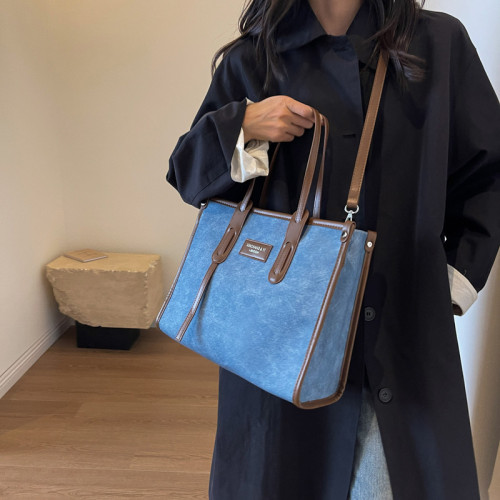 上班通勤包2025女大容量手提女包包新款感帆布撞色百搭斜背托特包
