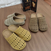 牛皮版夏季新款真皮生巧奶芙時髦鏤空雕花包頭厚底懶人勃肯半拖女