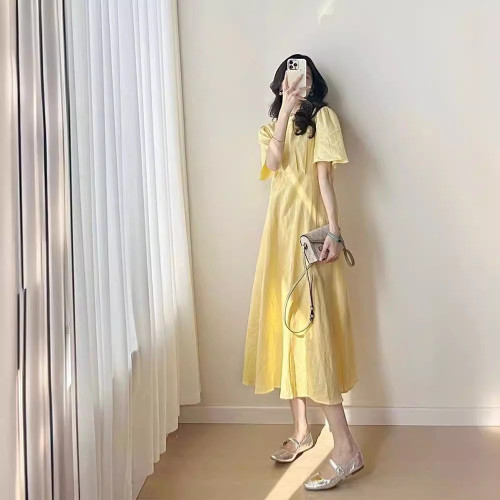 法式溫柔風黃色圓領連衣裙子女夏季2025新款初戀垂感過膝a字長裙