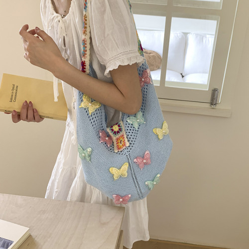 慵懶松弛感包包女大容量2025新款民族風蝴蝶針織包度假海邊沙灘包