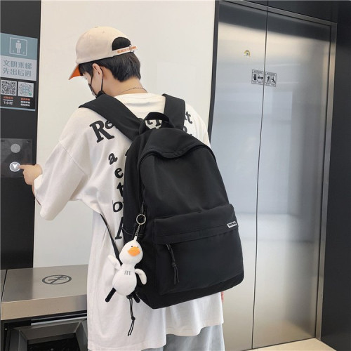 簡約純色大容量旅行雙肩包女韓版洋氣休閒後背包男情侶款學生書包