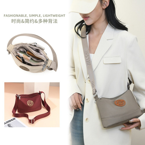 2024新款日常休閒女士斜後背包輕便簡約出行後背包百搭通勤純色單肩包