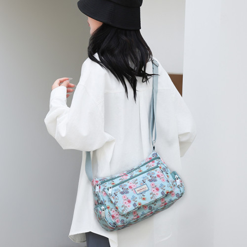 新款潮流印花女士單肩包大容量休閒出行後背包輕便時尚通勤斜後背包