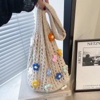 大容量通勤高級感花朵托特包女2025新款夏季鏤空針織包單肩編織包