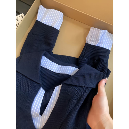 設計感假兩件撞色拼接條紋針織衫女早秋新款小衆顯瘦V領長袖上衣