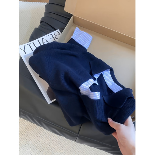 設計感假兩件撞色拼接條紋針織衫女早秋新款小衆顯瘦V領長袖上衣