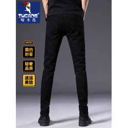 啄木鳥秋冬加絨褲子男士韓版彈力修身小腳秋冬款潮牌黑色牛仔褲男