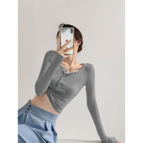 純欲風圓領單排釦長袖T恤女辣妹緊身短款上衣純色打底衫春秋冬