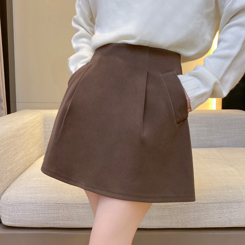 秋冬款毛呢料高腰繖裙女新款高級感濶挺蓬蓬a字花苞半身裙褲 秋冬款毛呢料高腰繖裙女新款高級感濶挺蓬蓬a字花苞半身裙褲