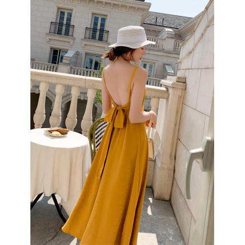 沙灘裙2025新款海邊旅遊度假性感露背長裙顯瘦V領吊帶連衣裙超仙