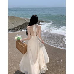 白色禮服裙純欲無袖V領掛脖連衣裙夏季新款溫柔氣質收腰顯瘦長裙