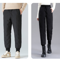 雪中飛2025冬新款男女同款鵞絨羽絨褲休閒束腳防風保暖禦寒黑色