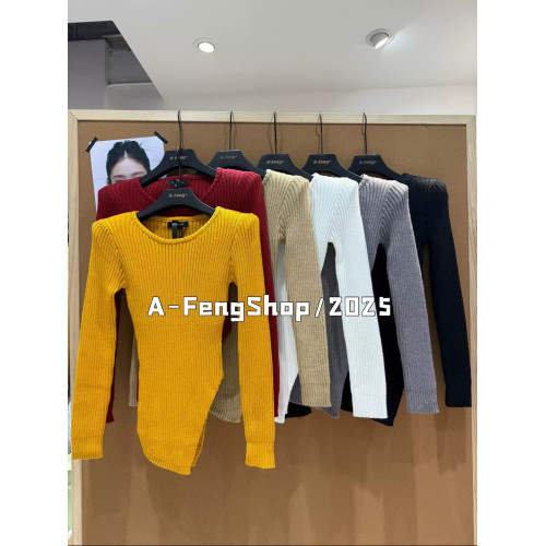 2025冬新款時尚氣質百搭顯瘦圓領長袖針織衫不規則下擺打底衫女