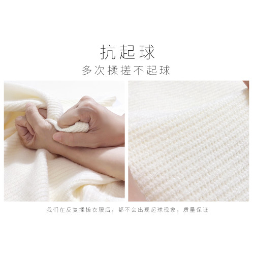 v領交叉短款毛衣女秋冬設計感小衆外穿套頭針織不規則上衣米色