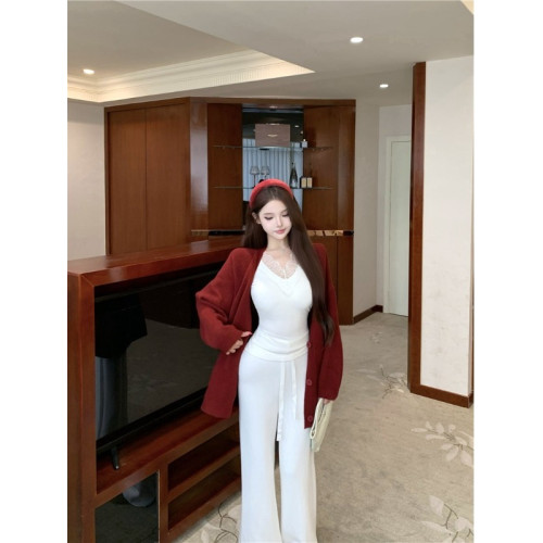 慵懶風中長款毛衣開衫女秋季2025新款V領單排釦寬松紅色針織上衣