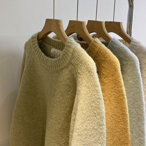 新款簡約卷邊圓領套頭毛衣女秋冬慵懶風寬松軟糯高級感針織上衣