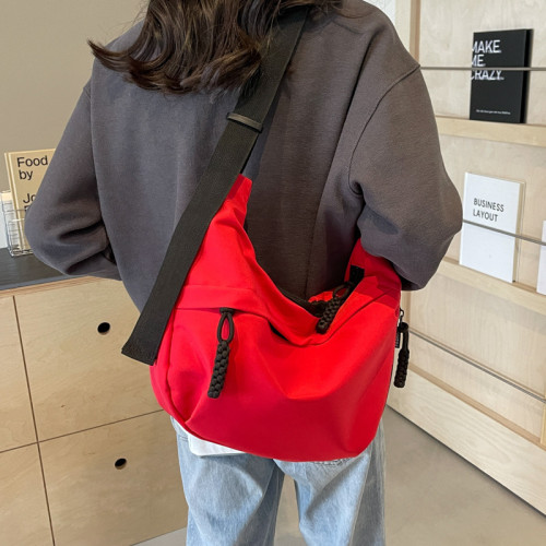 大容量帆布包包女2025新款休閒百搭通勤單肩包輕便運動斜背餃子包