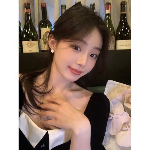 早春山茶花耳釘女輕奢小衆設計感高級耳飾女蚊香盤耳夾獨特耳環