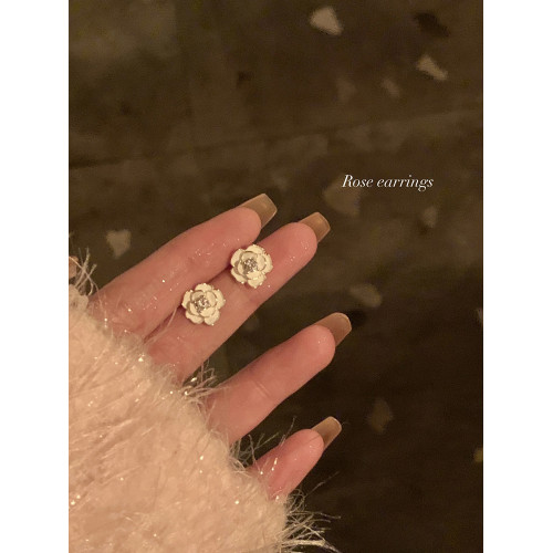 早春山茶花耳釘女輕奢小衆設計感高級耳飾女蚊香盤耳夾獨特耳環
