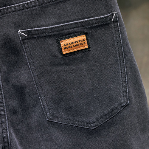 秋冬款彈力牛仔褲男黑色斜插袋2025新款修身小腳韓版潮流青年長褲