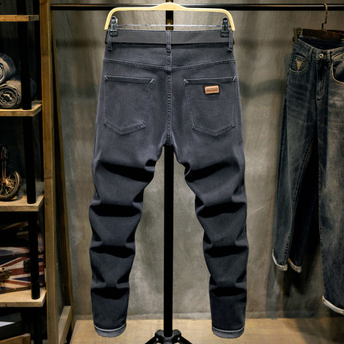 秋冬款彈力牛仔褲男黑色斜插袋2025新款修身小腳韓版潮流青年長褲