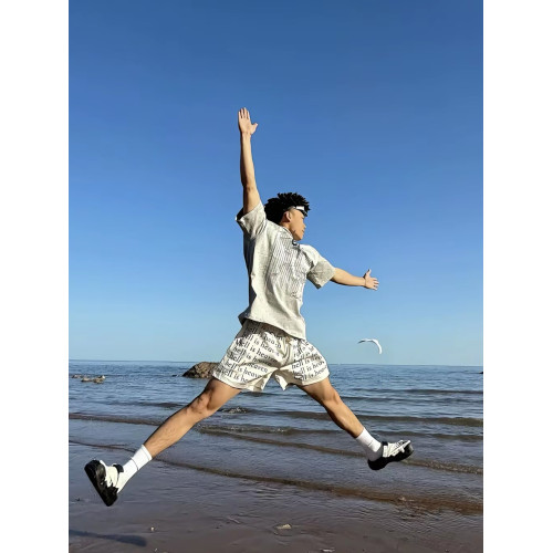 美式字母滿印抽繩四分短夏網眼籃球運動褲hell is heaven不過膝褲