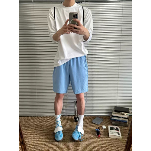 夏日多巴胺穿搭藍色尼龍速乾短褲男海邊沙灘度假休閒不過膝五分褲