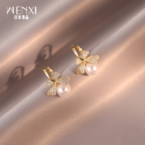 玫瑰金蝴蝶結耳環高級感輕奢韓國小衆珍珠耳釘女氣質新款秋冬耳飾