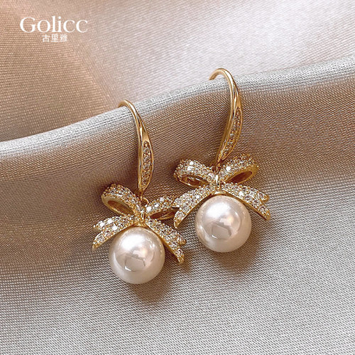 蝴蝶結珍珠吊墜耳環2026新款爆款高級感輕奢耳墜女氣質耳釘耳飾品 蝴蝶結珍珠吊墜耳環2026新款爆款高級感輕奢耳墜女氣質耳釘耳飾品